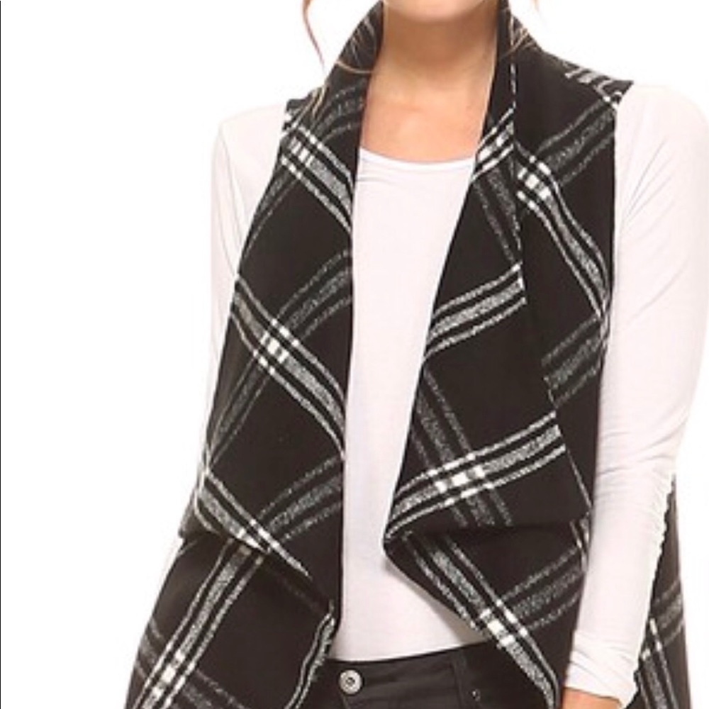 Black and white vest.